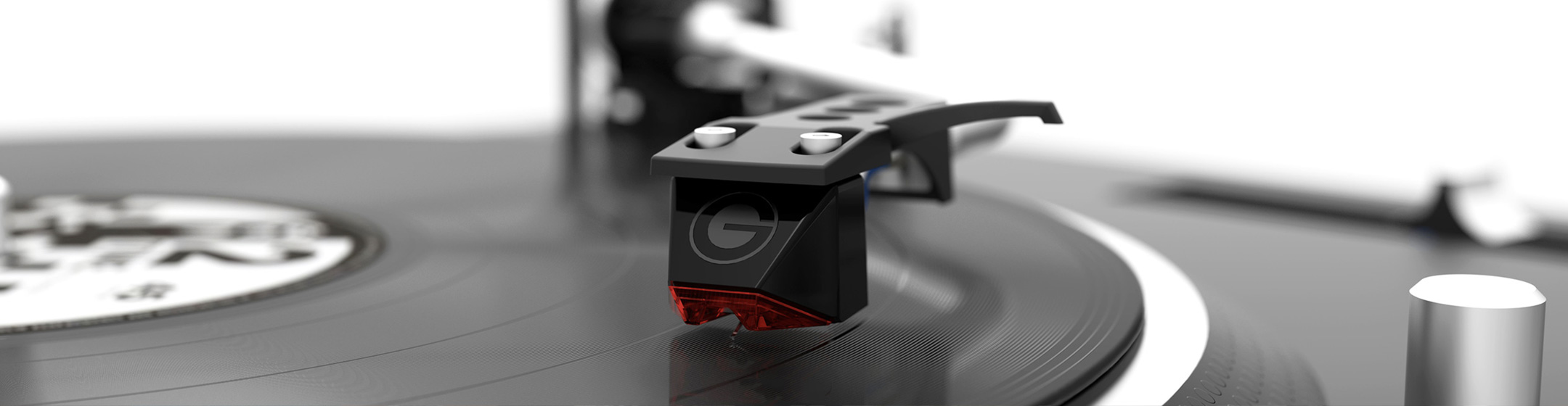 Pic showing a Goldring stylus attached to a tone arm playing a vinyl record